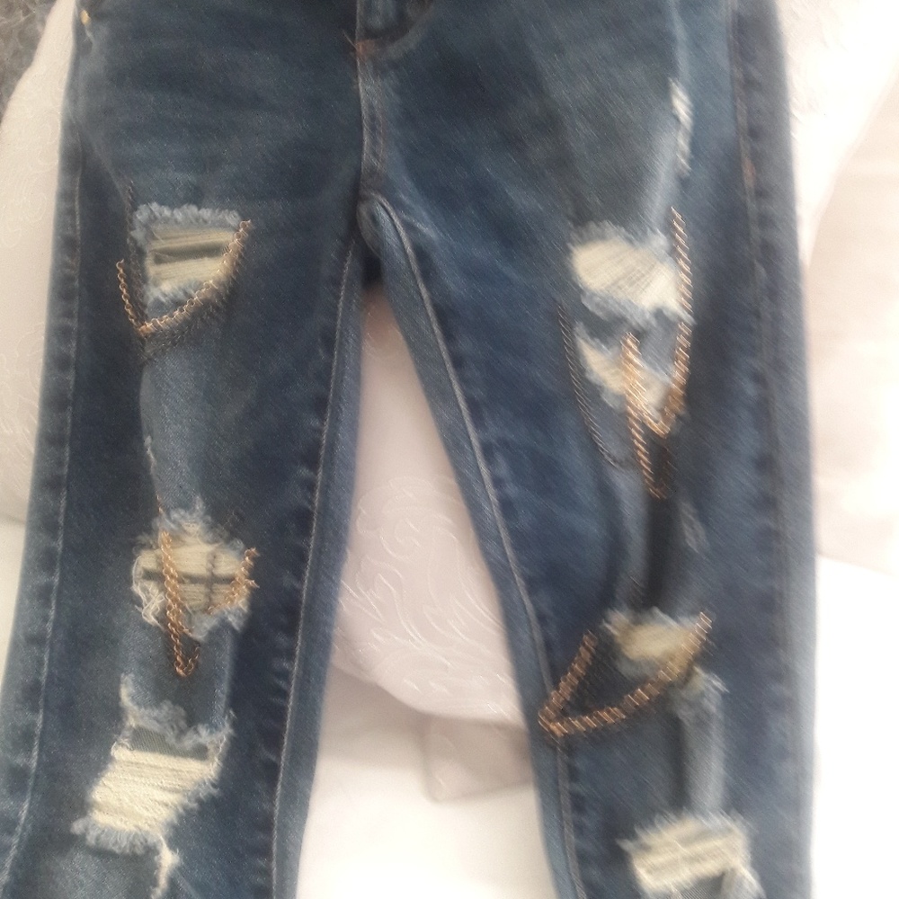 Guess distressed jean with chain embellishment